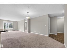 Laundry room - #222 5810 Mullen Pl Nw, Edmonton, AB T6R0W3 Photo 7