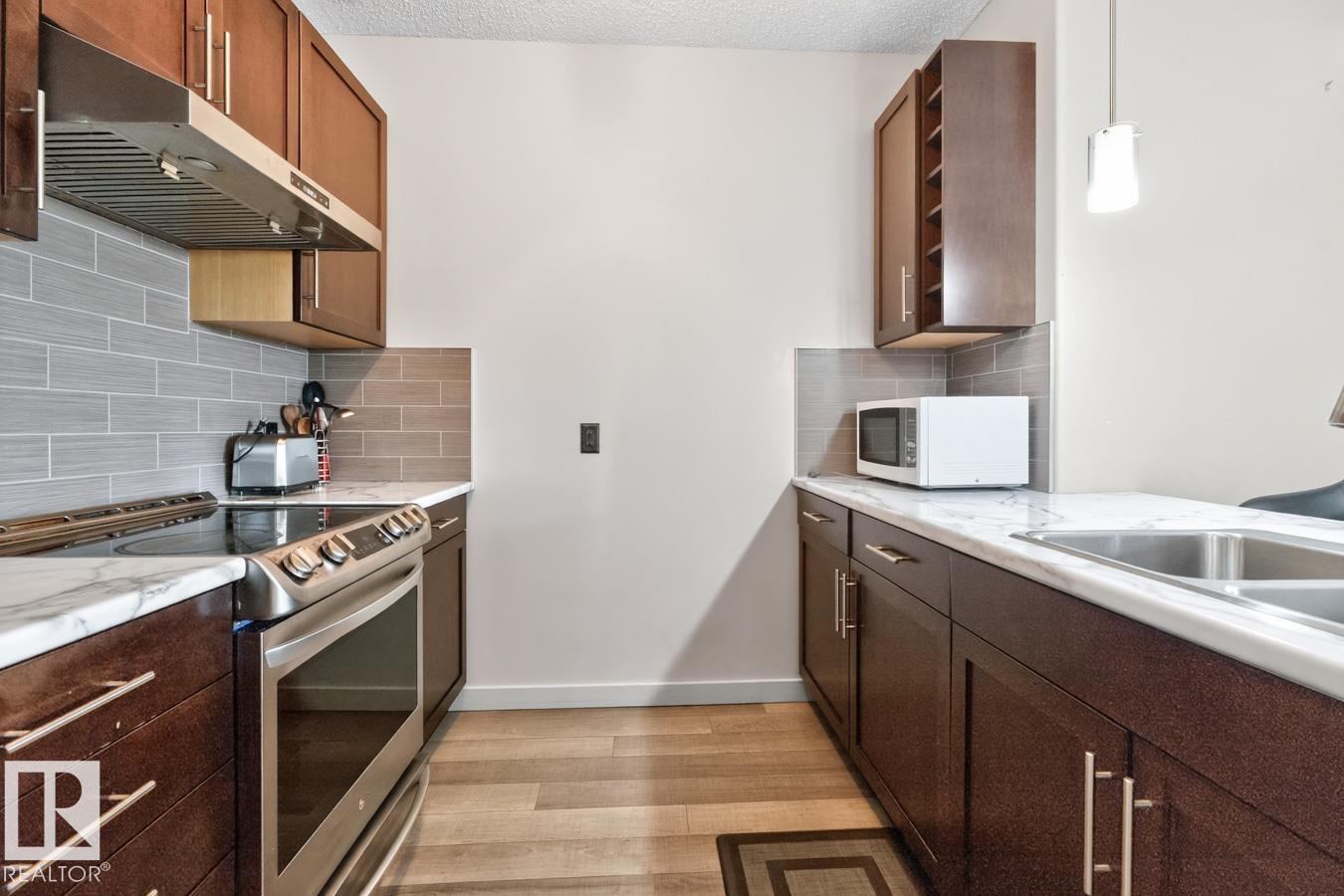 #307 1144 ADAMSON DR SW - 13
