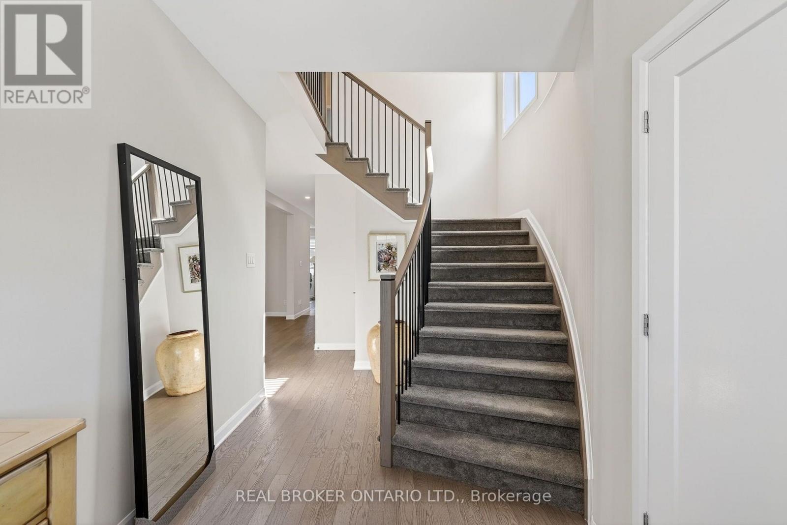 9' ceilings and hardwood floors throughout main