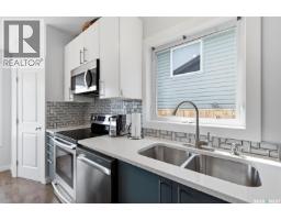 Family room - 204 Quessy Drive, Martensville, SK S0K0A2 Photo 12