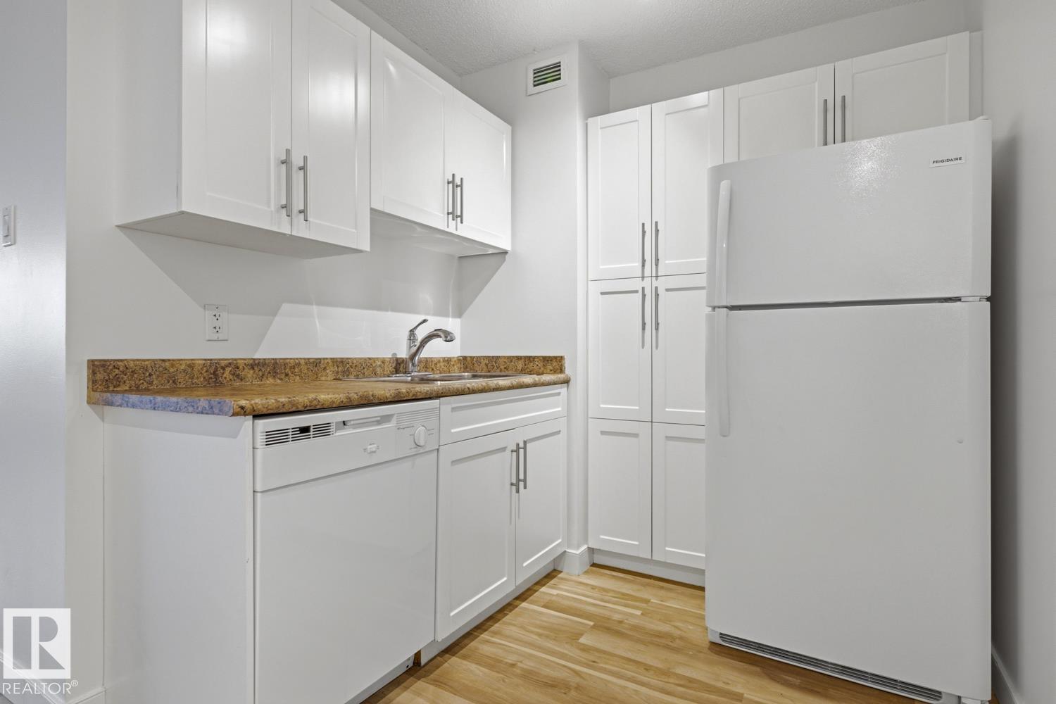 703 9710 105 Street NW