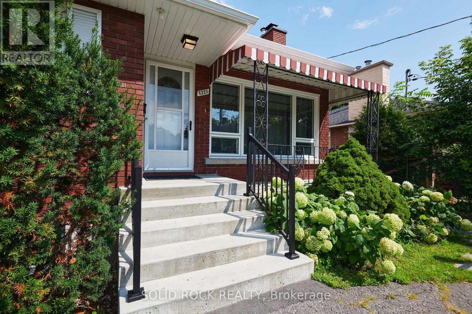 Cute porch with front steps redone in 2024.