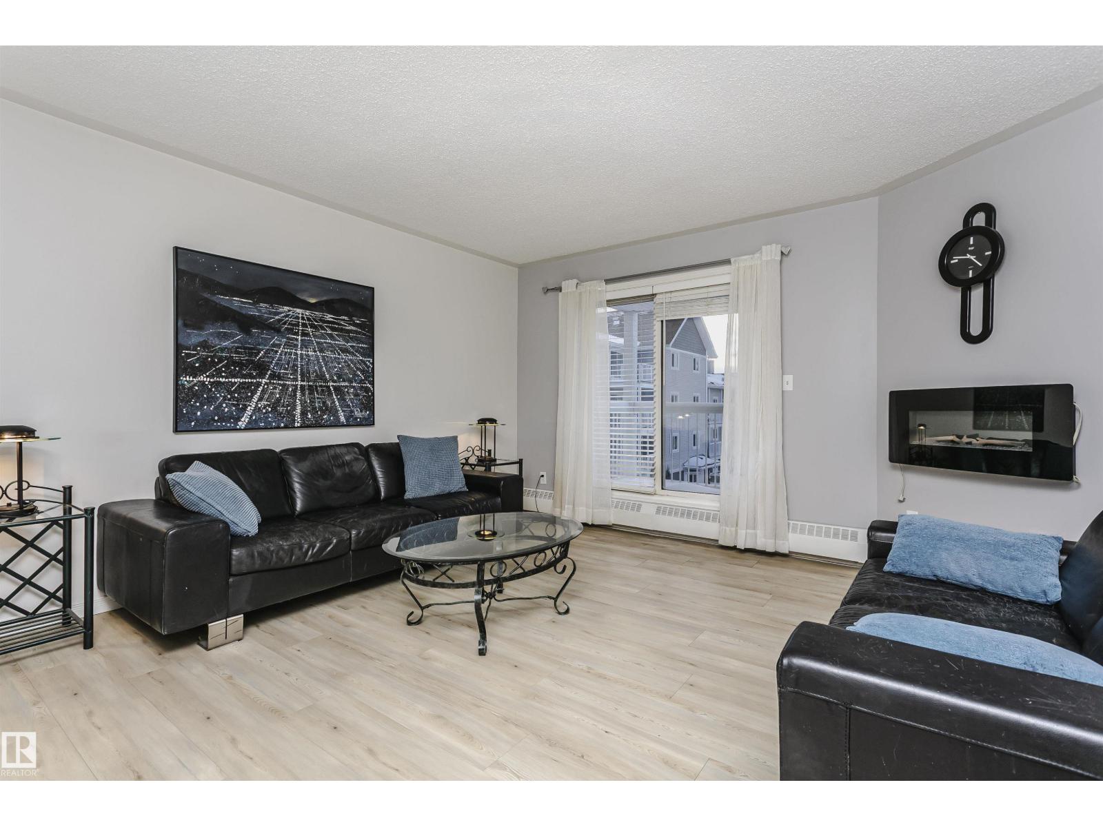 #302 5005 31 AV NW - 8