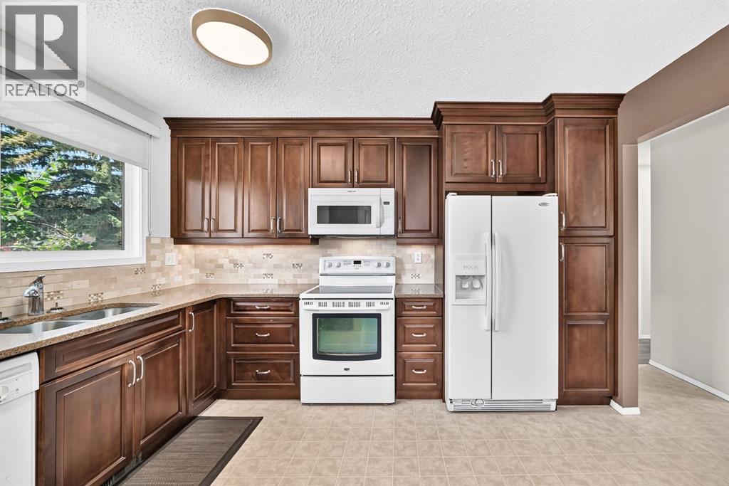 108 Falconridge Close Northeast - Photo 12