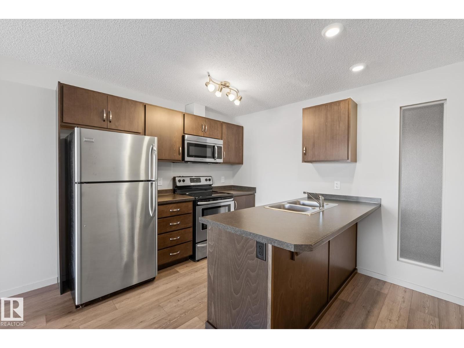 #405 7711 71 ST NW - 2