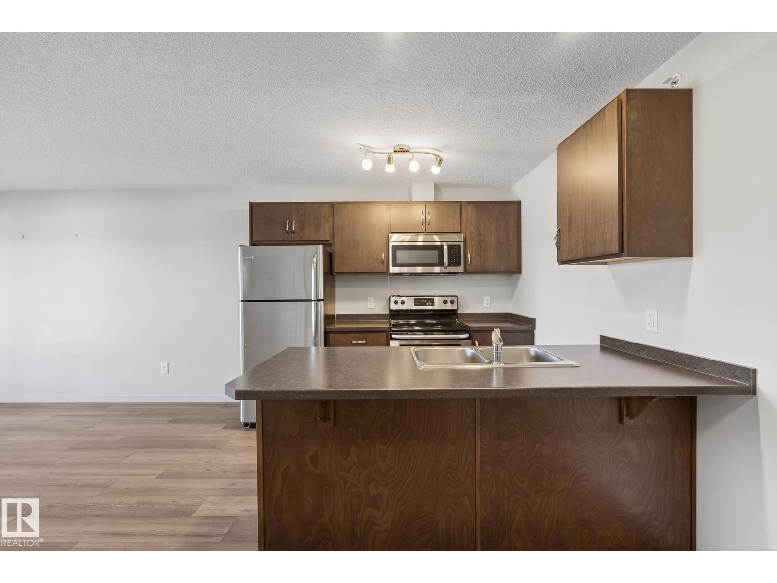 #405 7711 71 ST NW - 6