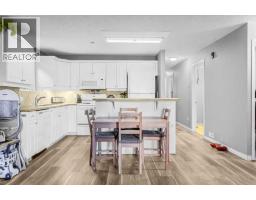 Primary Bedroom - 102, 139 26 Avenue Nw, Calgary, AB T2M2C8 Photo 6