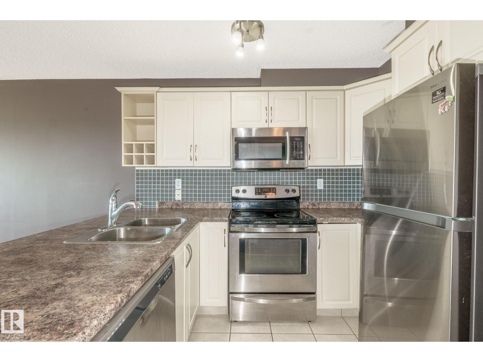 #418 17404 64 AV NW - 3