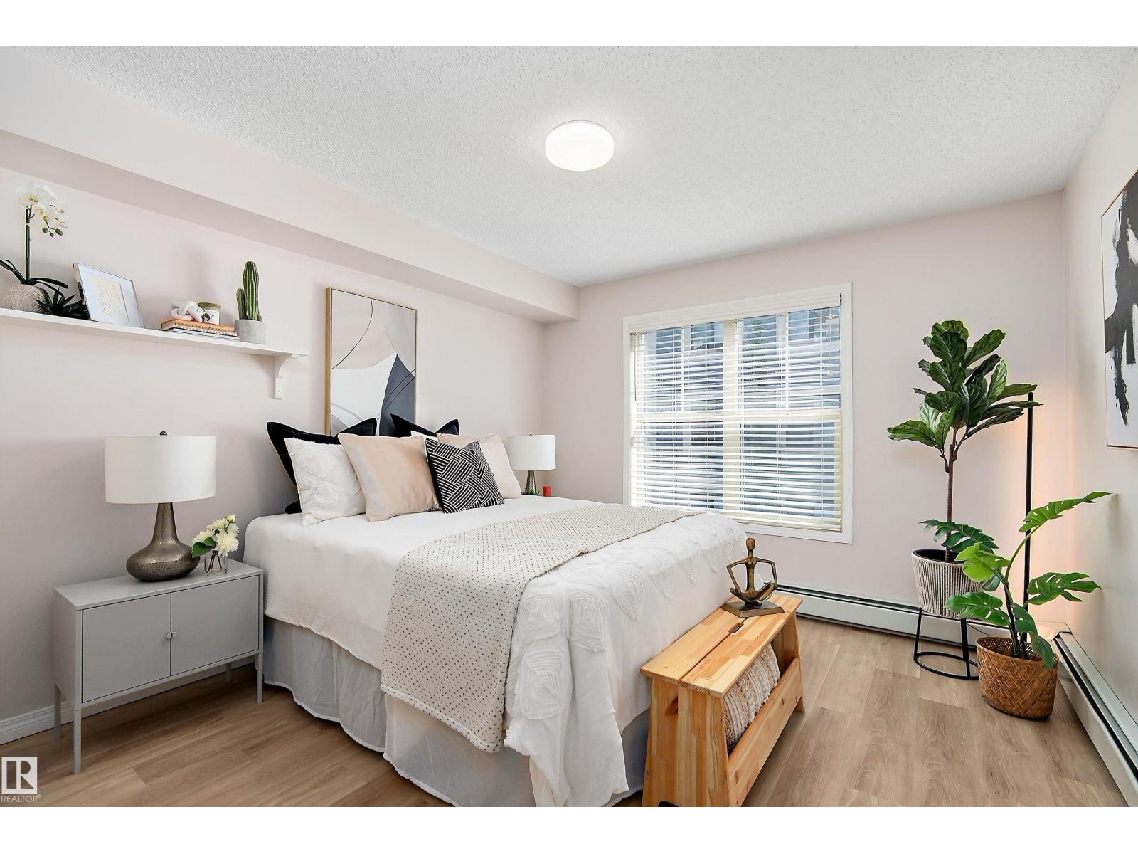 #201 11453 ELLERSLIE RD SW - 23