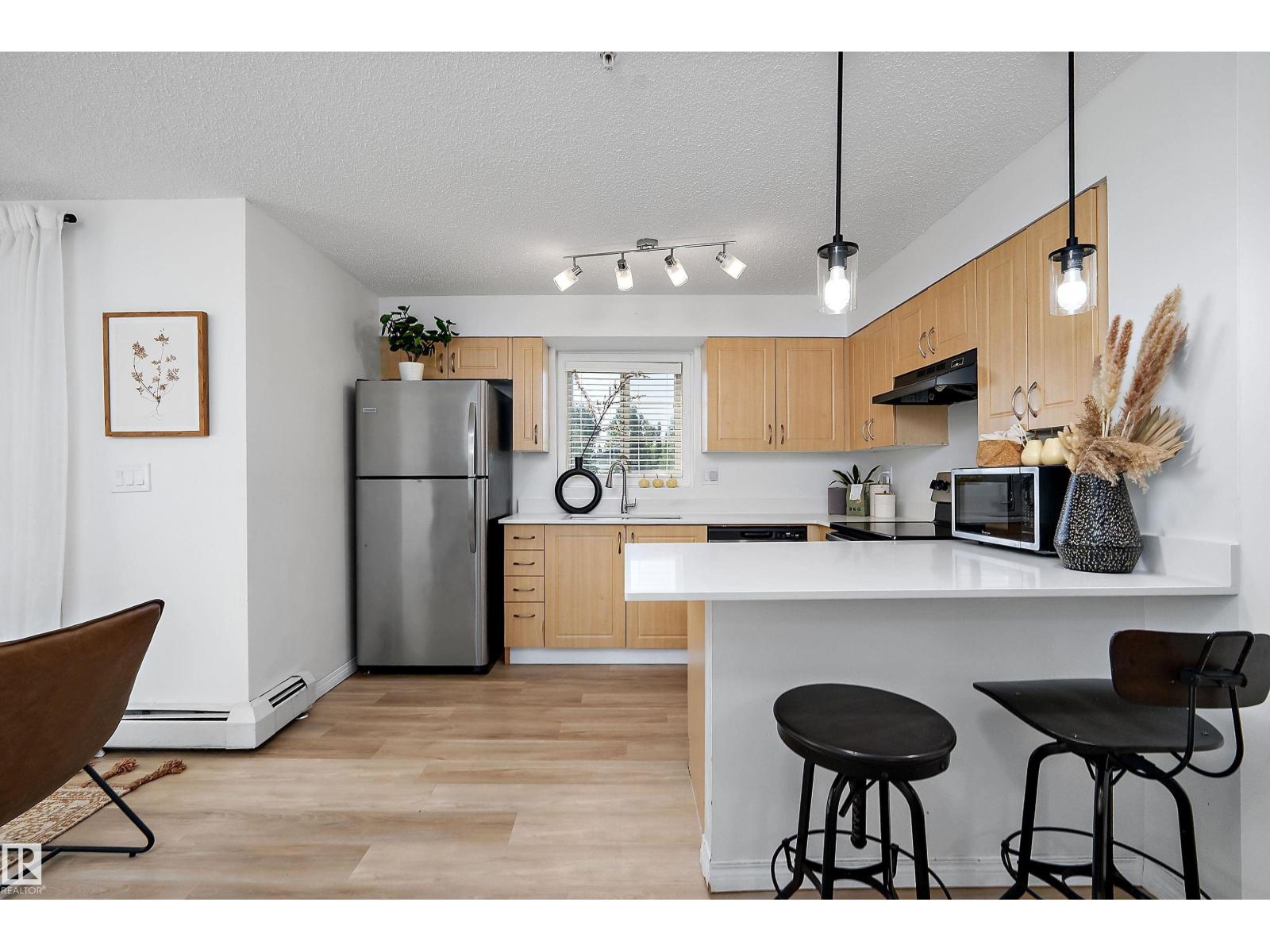 #201 11453 ELLERSLIE RD SW - 7
