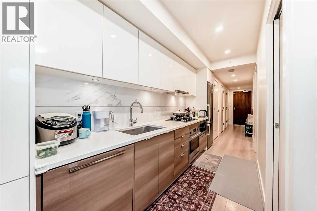 #104 108 Waterfront Court SW - 19