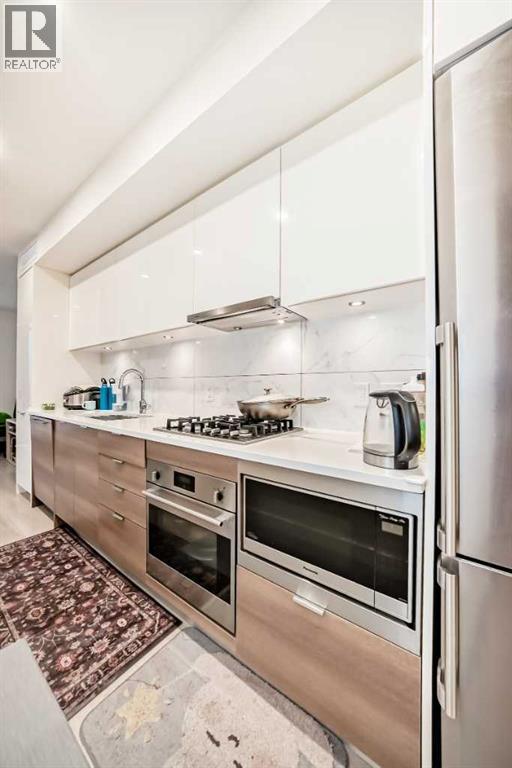 #104 108 Waterfront Court SW - 23