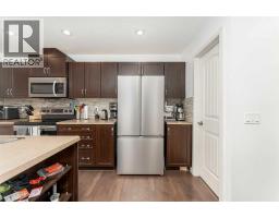 Bedroom - 562 River Heights Crescent, Cochrane, AB T4C0T8 Photo 8