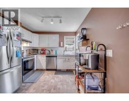 Bedroom - 13, 200 Hidden Hills Terrace Nw, Calgary, AB T3A6E8 Photo 10