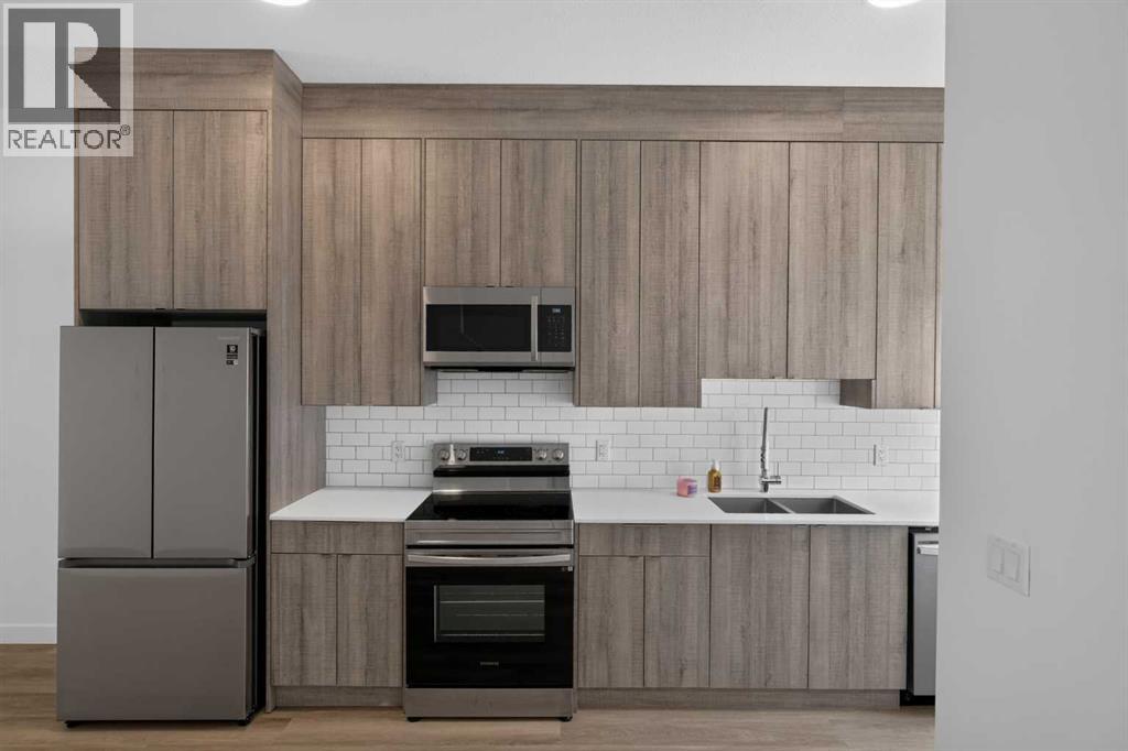#202 101 Panatella Square NW - Image 11