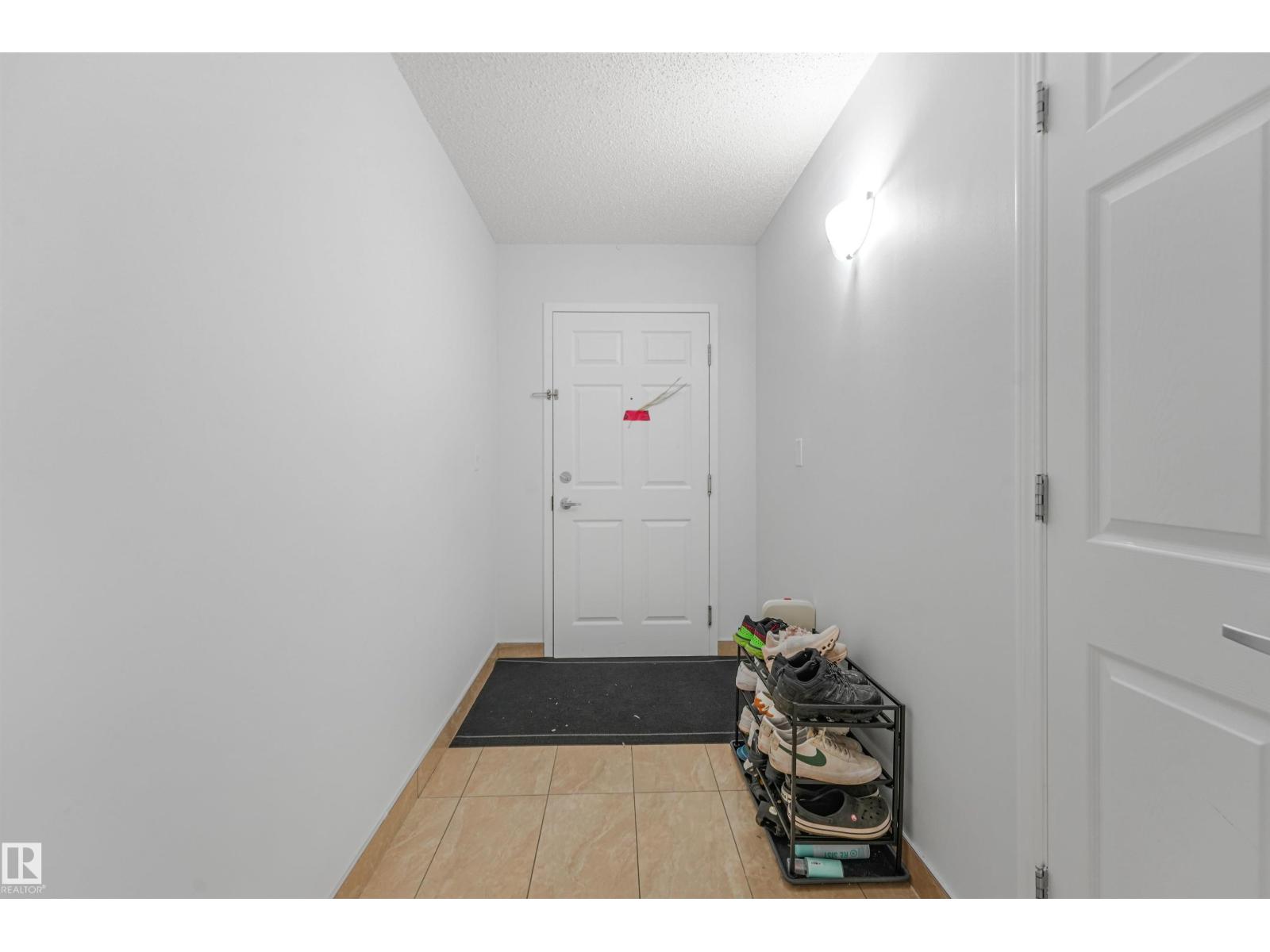 #2-208 4245 139 AV NW - 25