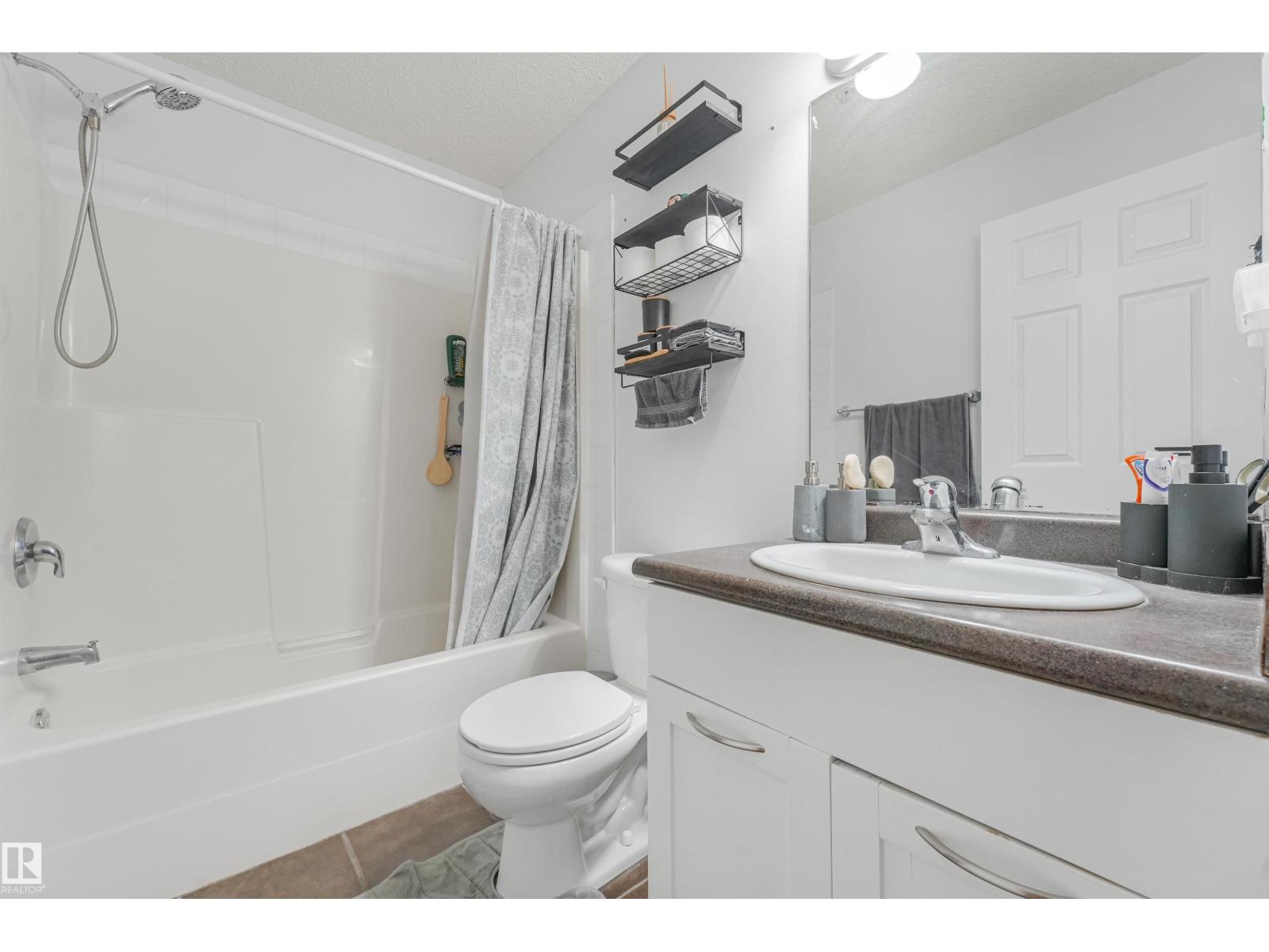 #2-208 4245 139 AV NW - Image 37