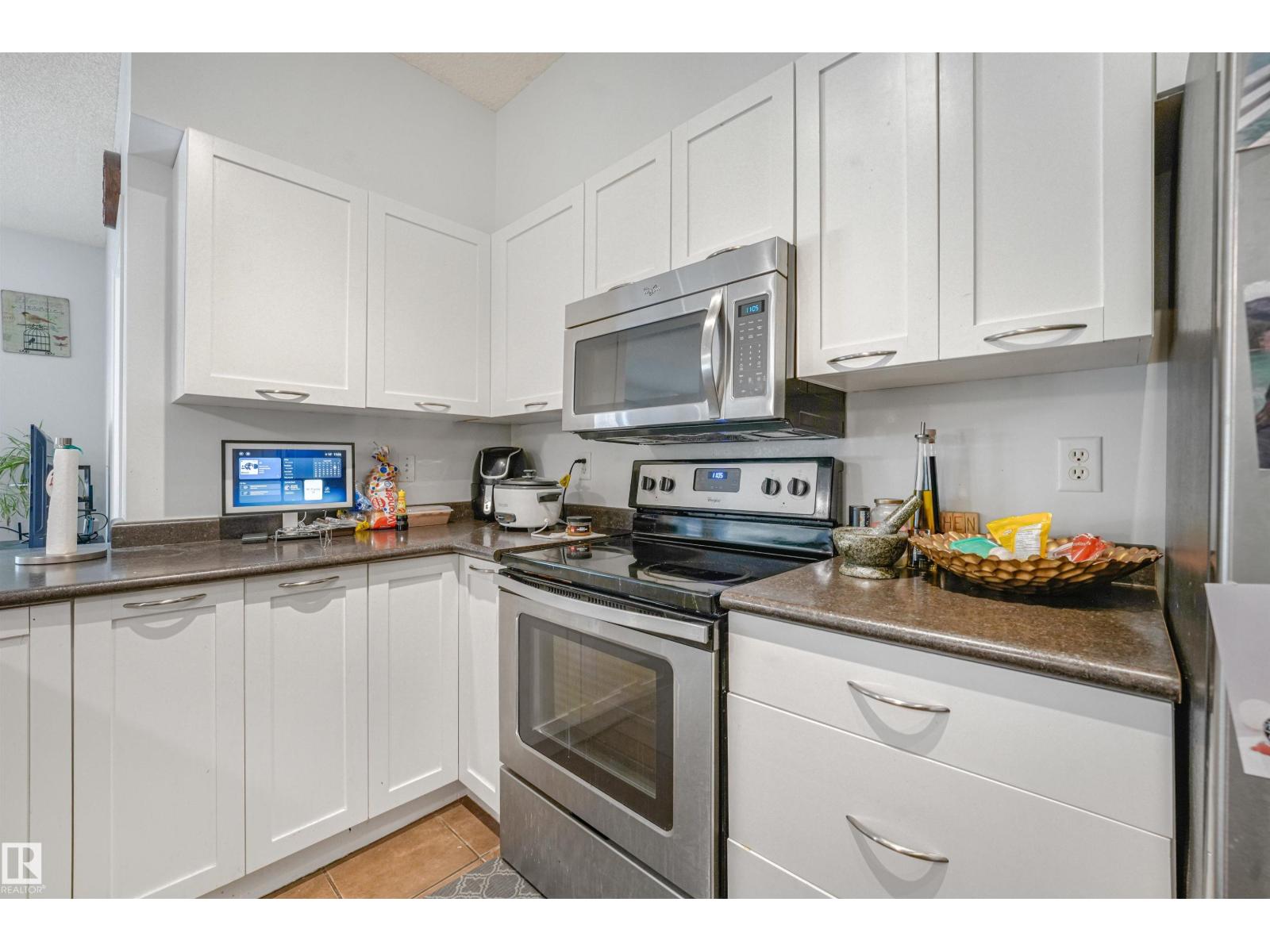 #2-208 4245 139 AV NW - Image 43