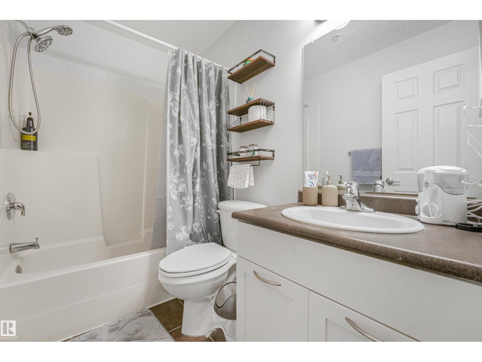 #2-208 4245 139 AV NW - 54
