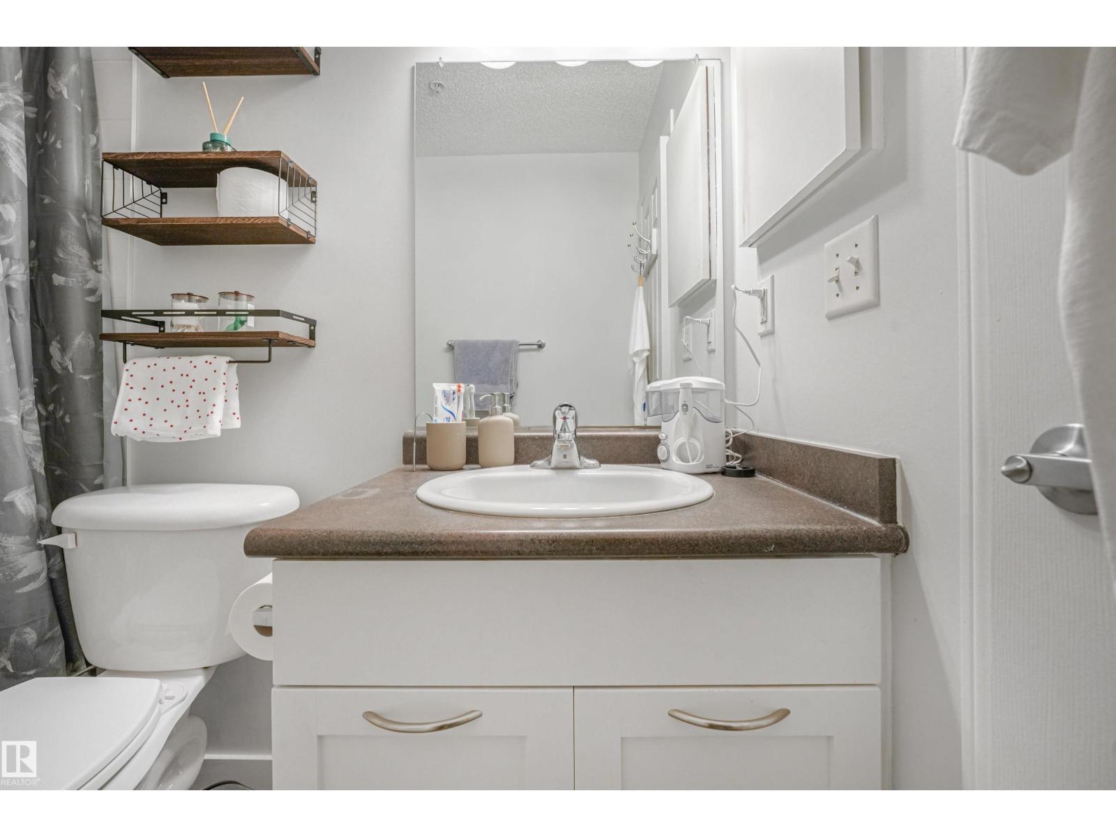 #2-208 4245 139 AV NW - Image 56