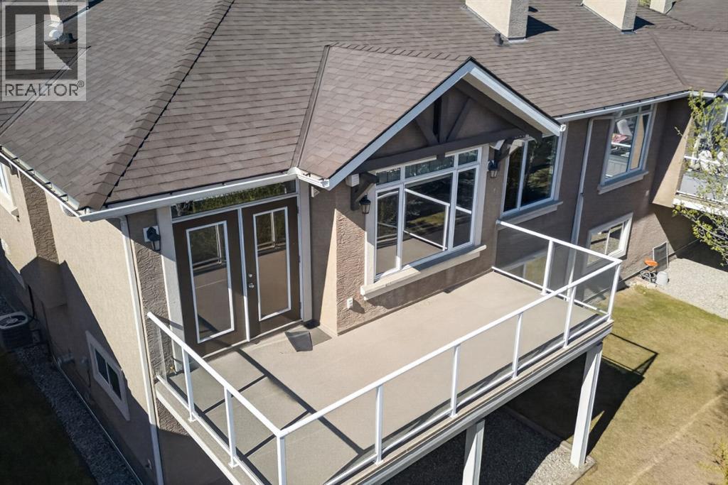 14 Discovery Woods Villas SW, Calgary — photo 3