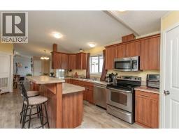 Kitchen - 65, 15 Mackenzie Ranch Way, Lacombe, AB T4L0B4 Photo 7