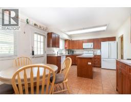 Family room - 210 Wallace Road, Kelowna, BC V1X4T1 Photo 9