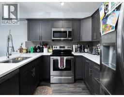 Primary bedroom of 803 6798 WESTGATE AVENUE · Prince George, BC