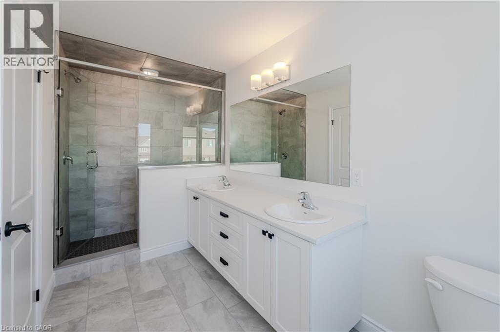 406 ROBERT WOOLNER Street - 13