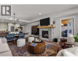 Living room - 206, 1105 Spring Creek Drive, Canmore, AB T1W0M6 Photo 9