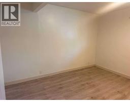 Living room - 5009 51 Avenue, Taber, AB T1G1N3 Photo 9