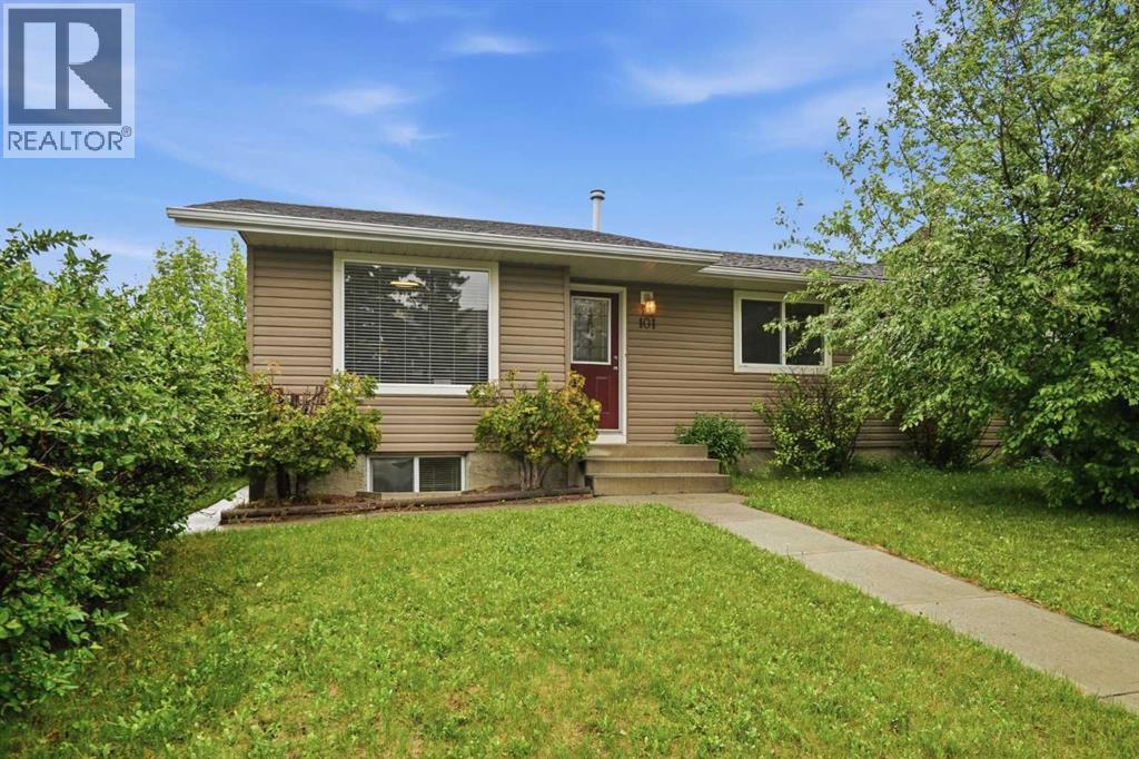 FRONT ELEVATION - large living room window and good sized lower level windows