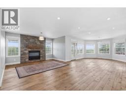 Family room - 31055 Elbow River Drive, Rural Rocky View County, AB T3Z2T9 Photo 7