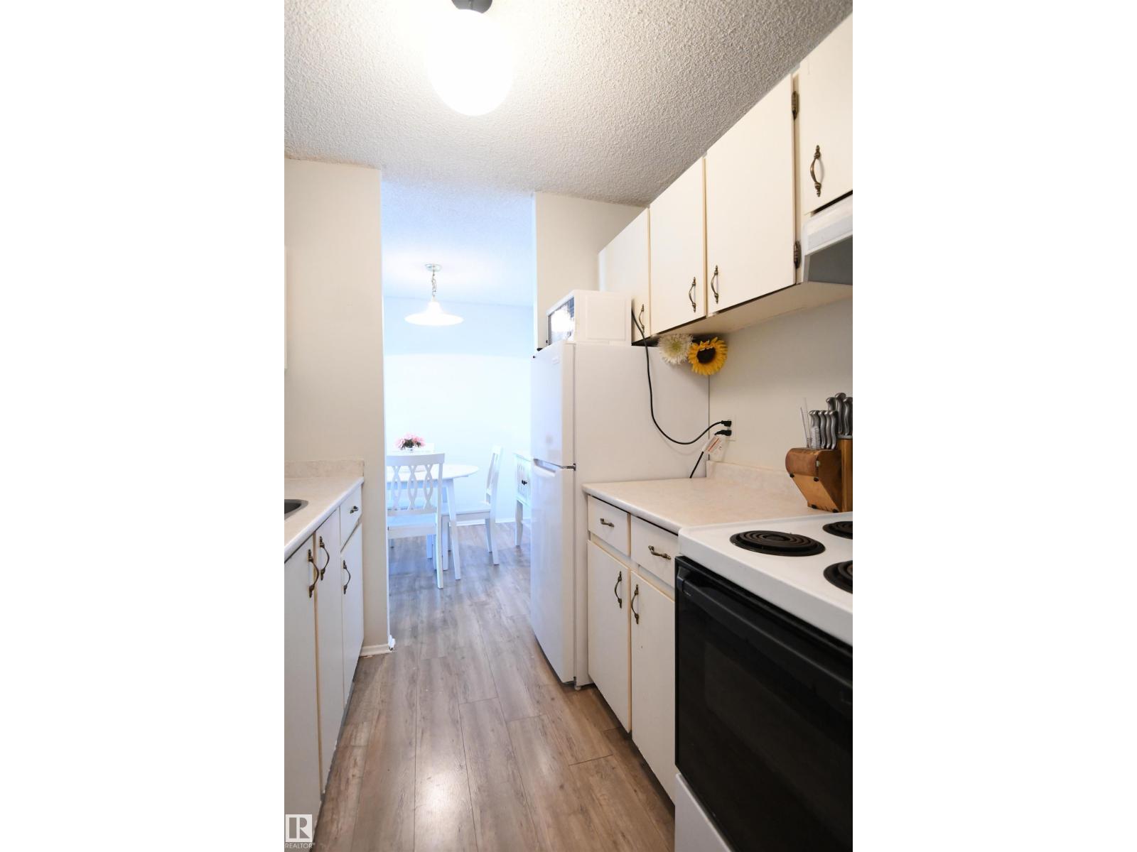 #1305 13910 STONY PLAIN RD NW - 11