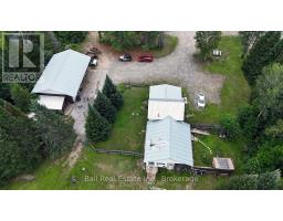 Sunroom - 19573 Highway #118 Highway E, Highlands East, ON K0L3C0 Photo 10