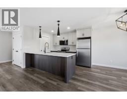 Living room - 20 Toye Street, Red Deer, AB T4P0Y5 Photo 8