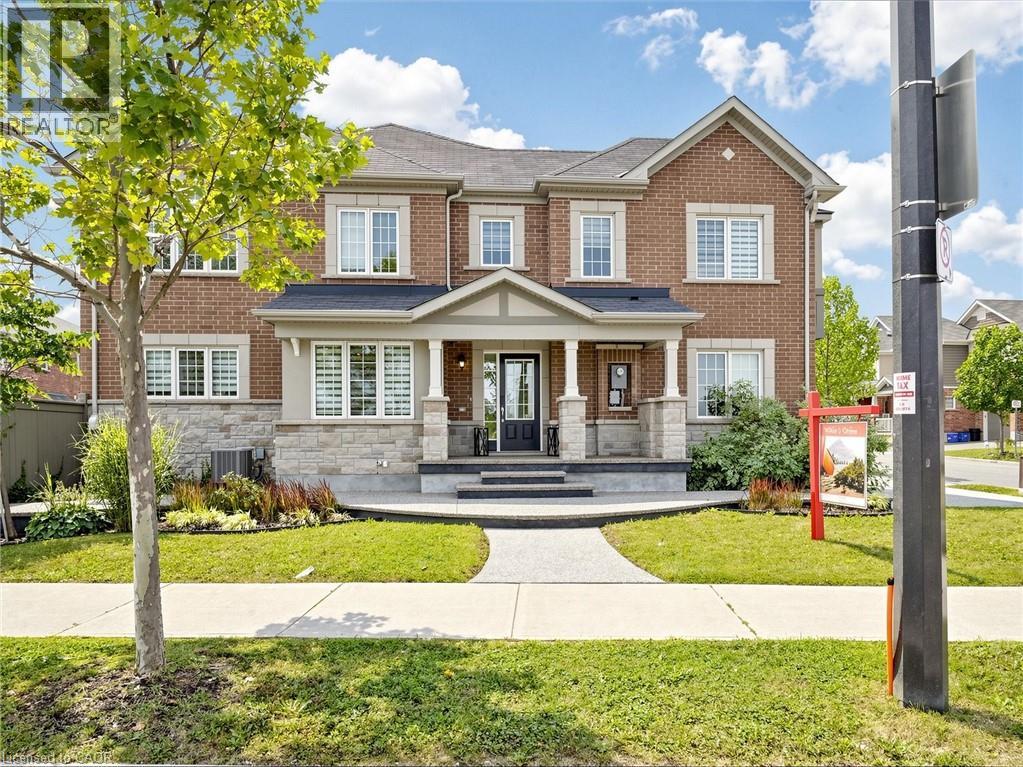 Brick exterior with stone accents and a covered front porch