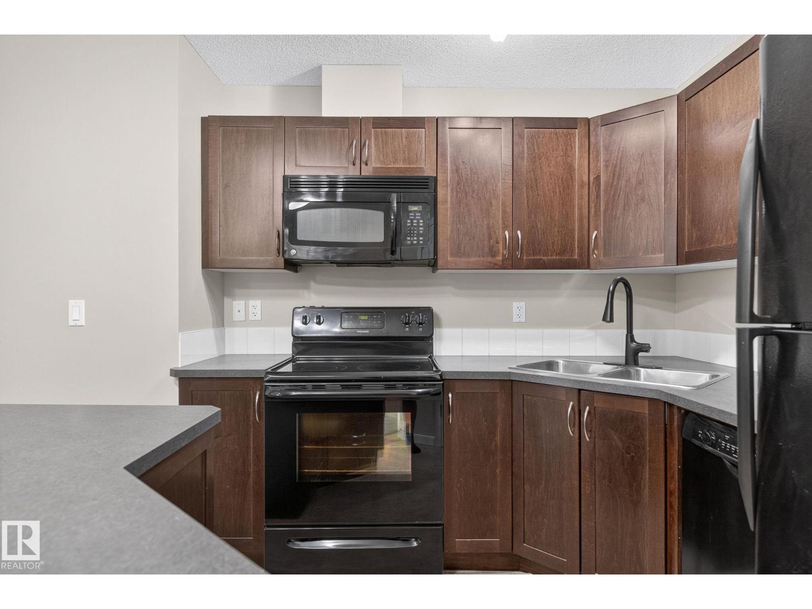 #210 392 SILVER BERRY RD NW - Image 13