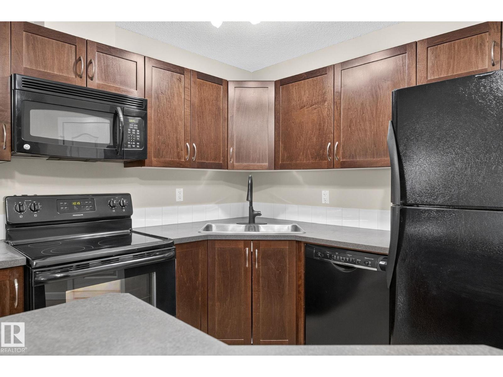 #210 392 SILVER BERRY RD NW - 14
