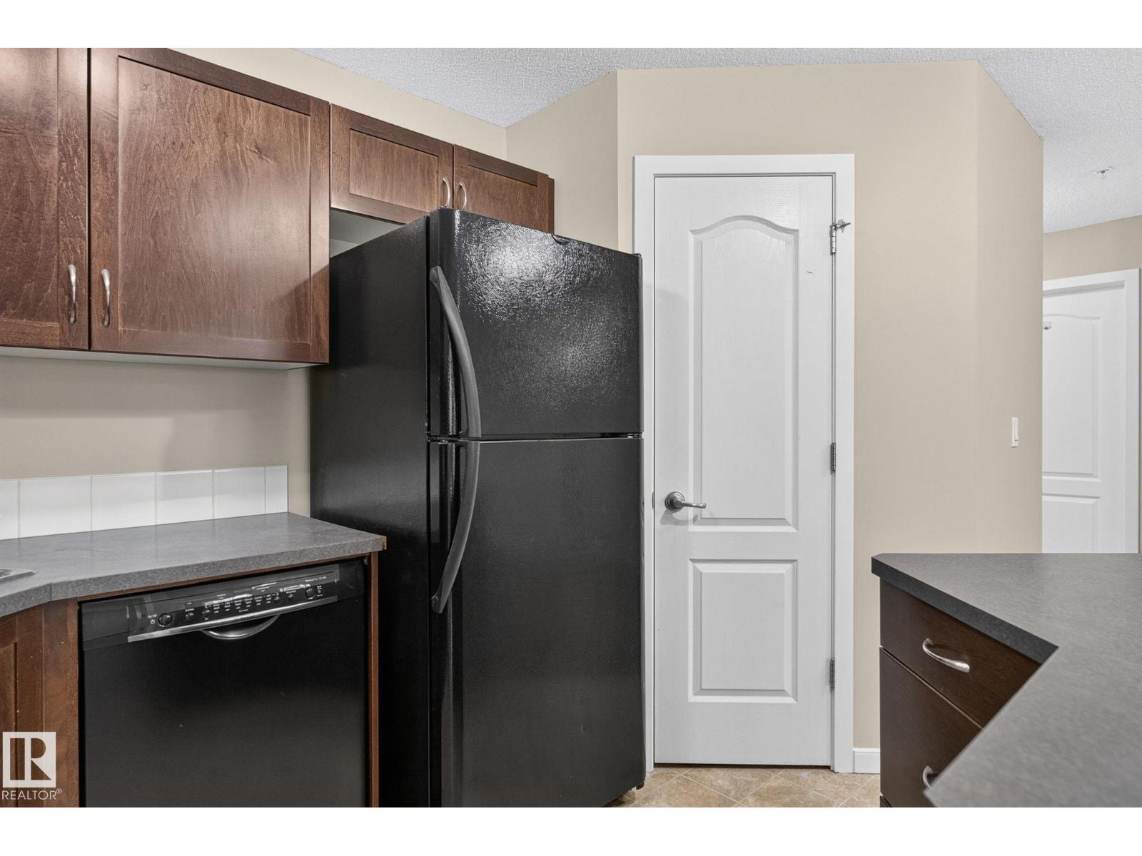 #210 392 SILVER BERRY RD NW - Image 15