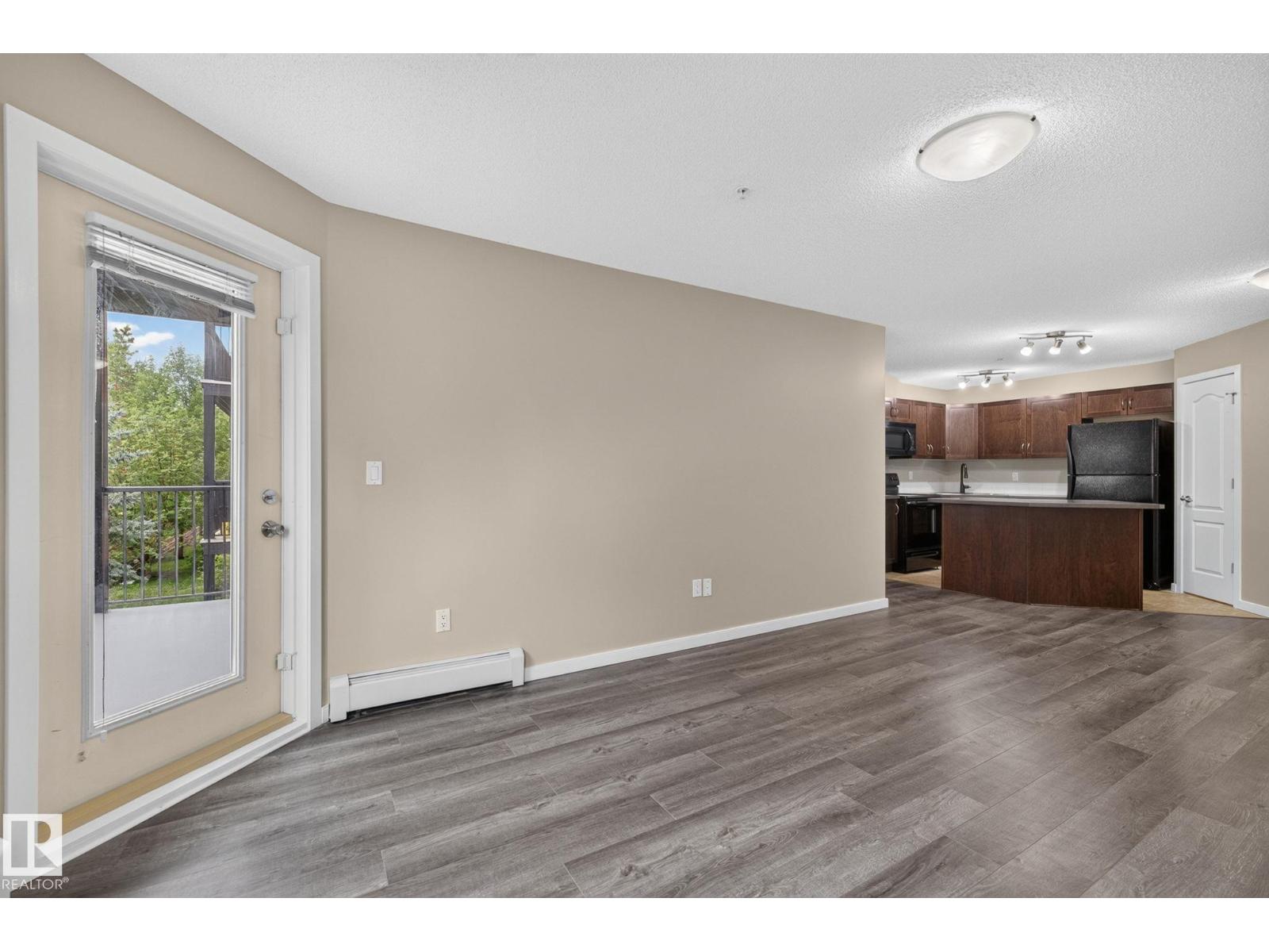 #210 392 SILVER BERRY RD NW - 18