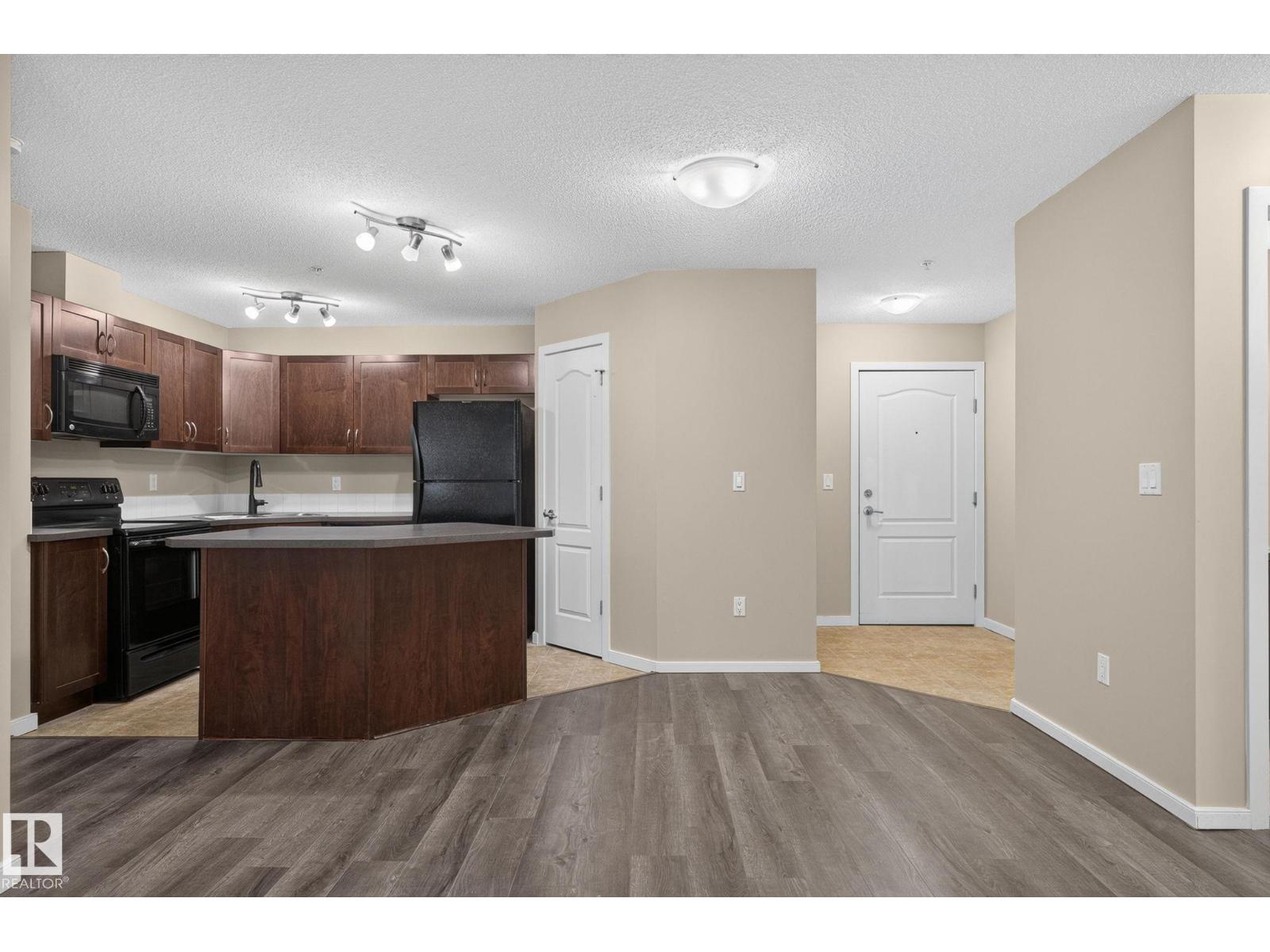 #210 392 SILVER BERRY RD NW - Image 8