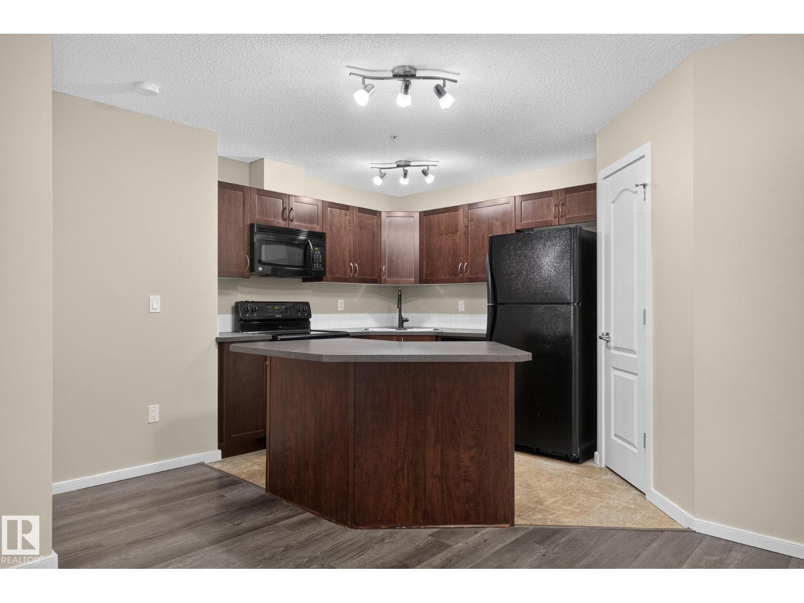 #210 392 SILVER BERRY RD NW - Image 9