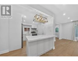 Living room - 18 Elderfield Crescent, Toronto, ON M9C3K7 Photo 11