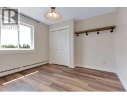 Family room - 4, 41207 Range Road 263, Rural Lacombe County, AB T4L2N4 Photo 22