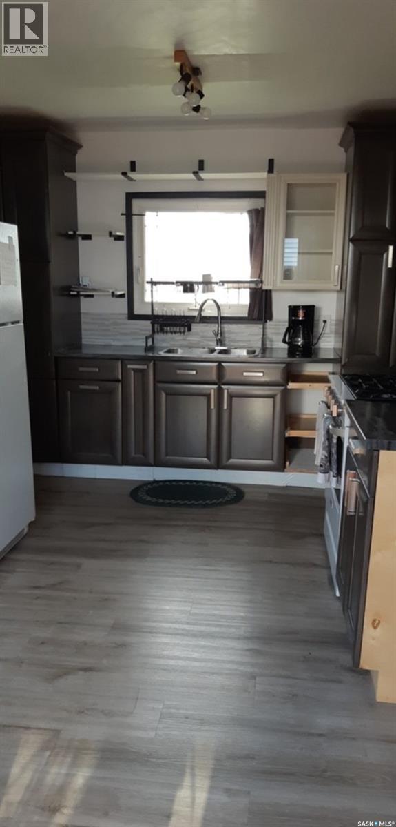 301 8th AVENUE E, Melville — photo 3