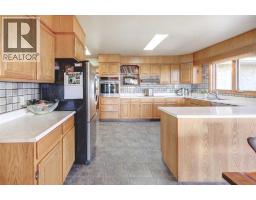Family room - 274133 Range Rd. 252, Rural Rocky View County, AB T0M0G0 Photo 15