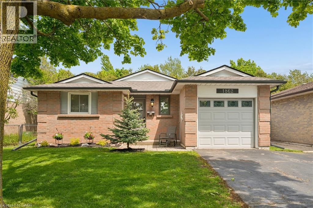 Brick ranch-style exterior with a gabled roofline and attached single-car garage