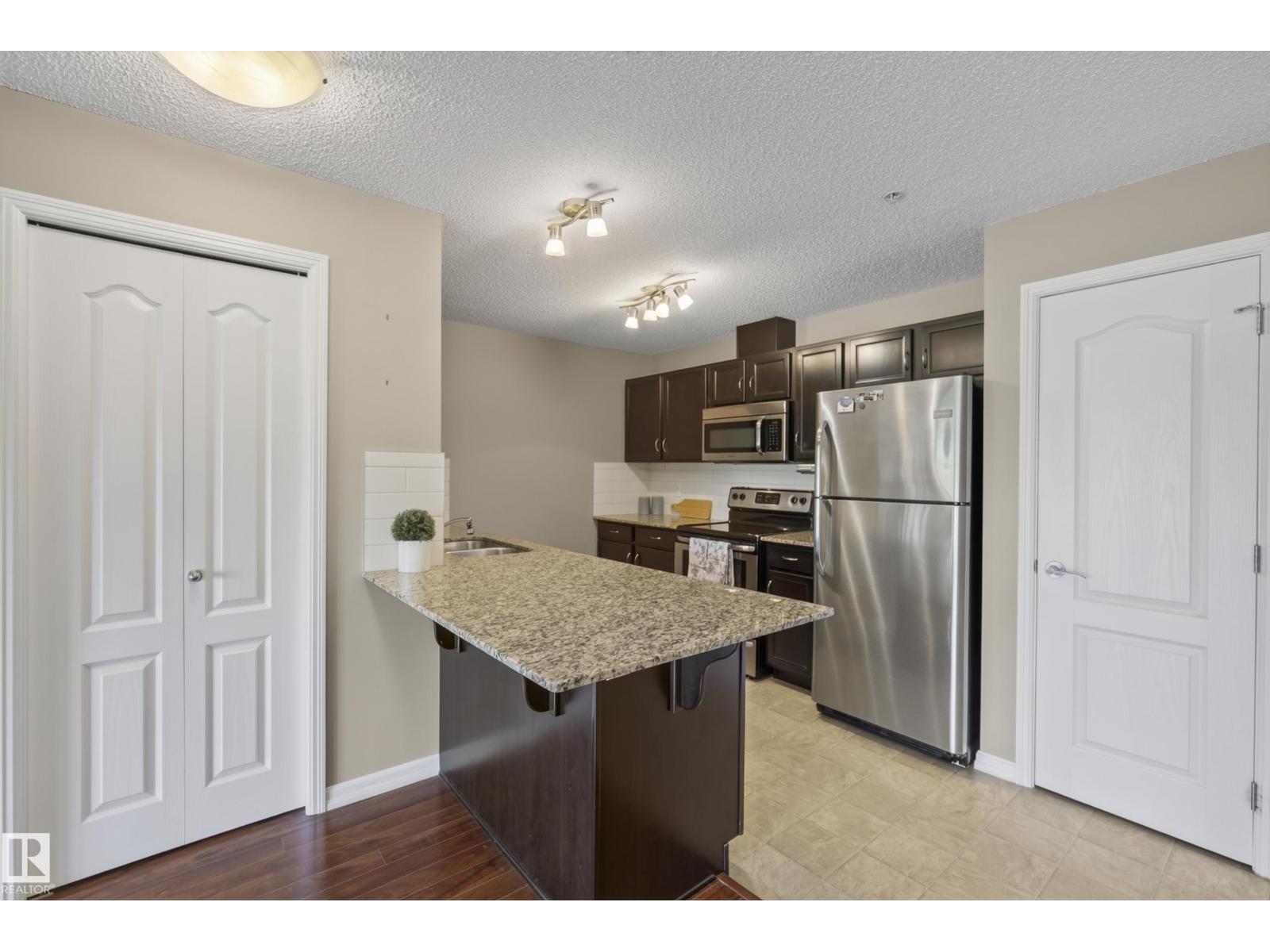 #108 271 CHARLOTTE WY - 4