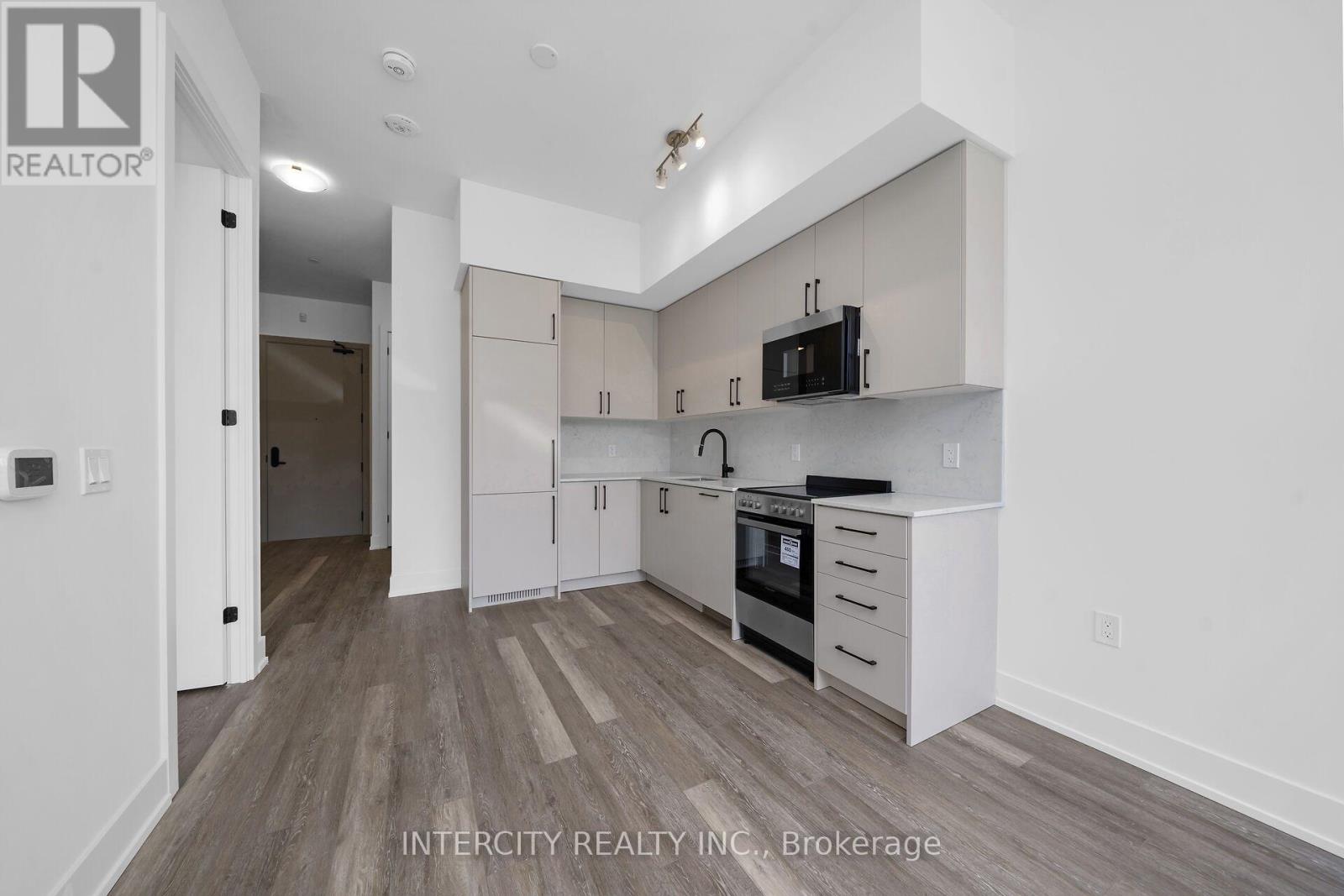 #105 2075 KING ROAD - Image 13